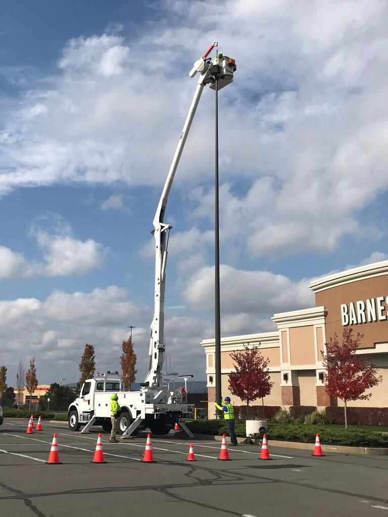 Herron Electric working on a light pole